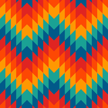 Ethnic style seamless pattern with chevron lines. Native americans ornamental background. Tribal motif. Colorful mosaic