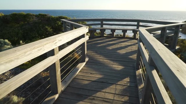 Attis point beach and lookout on Great Ocean Road, Australia, at sunset, stabilized dolly shot.