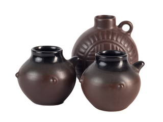 traditional Georgian ceramic utensils (chinchila) for wine on a white background