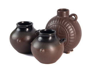 traditional Georgian ceramic utensils (chinchila) for wine on a white background