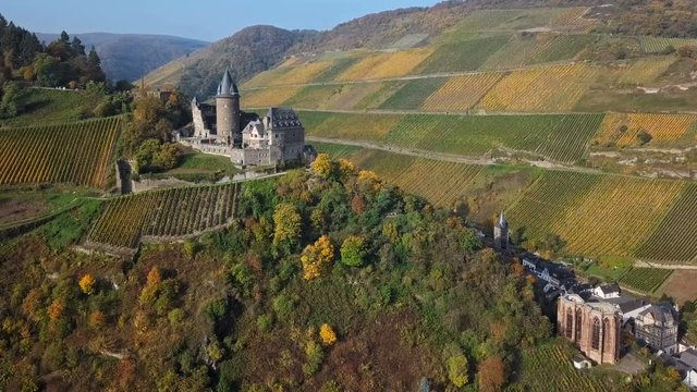 Aerial view of autumn Rhine valley, Bacharach town and Stahleck Castle, Germany