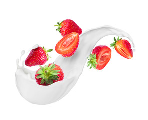 Strawberry with milk splashes close-up isolated on white background