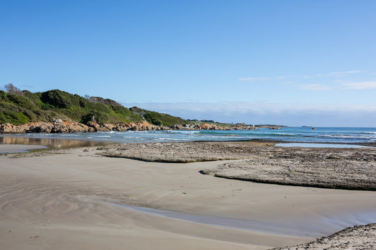 Green point beach in Tasmania, Australia, during a peaceful autumn morning