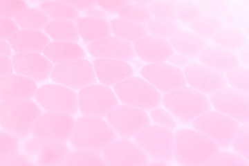 Light Rose Foam Plastic Texture. Abstract Styrofoam Background. Macro Closeup.