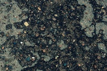 the texture of the old asphalt. small pebbles crack grunge