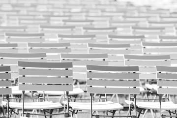 White chair rows in a spa park in black & white bright
