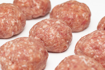 Meat minced red on white background.