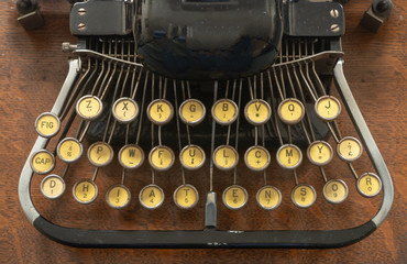 Ancient vintage portable typewriter with non qwerty keyboard