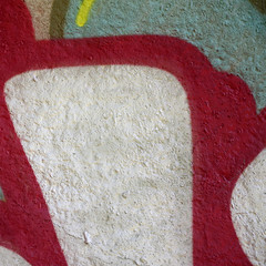 Street art. Abstract background image of a fragment of a colored graffiti painting in chrome and...