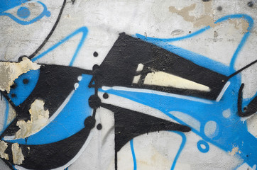 Street art. Abstract background image of a fragment of a colored graffiti painting in chrome and...