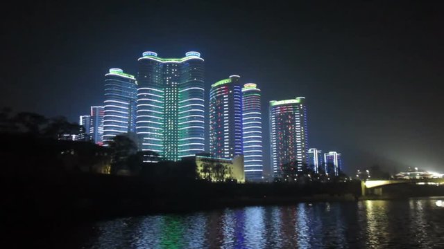 Pyongyang, new modern buildings in the centre of Pyongyang colourfully illuminated at night, North Korea, DPRK, Asia