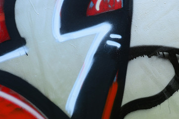 Street art. Abstract background image of a fragment of a colored graffiti painting in chrome and...