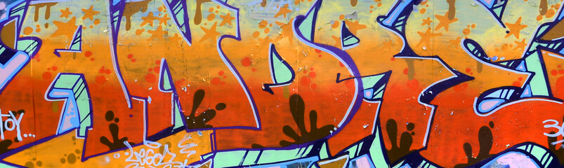 Street art. Abstract background image of a full completed graffiti painting in beige and orange tones
