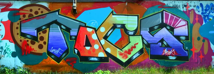 Straßenkunst. Abstraktes Hintergrundbild eines vollständig fertiggestellten Graffiti-Gemäldes in vielen modischen Farben und Tönen © mehaniq41