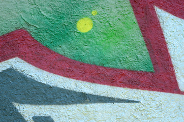 Street art. Abstract background image of a fragment of a colored graffiti painting in chrome and...