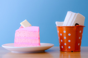 pink cake and  Tissue in tank on blue background,break time,select focus.