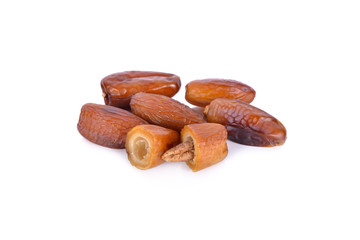 whole and half date fruit with seed on white background