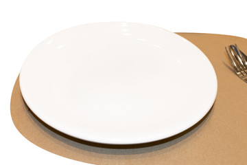 White dish ,spoon and fork to creative for design and decoration isolate on background.Copy space.