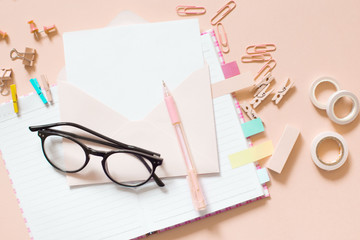 Flat lay stylish set. School stationery. Back to school concept. Pink background.