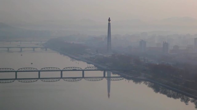  Pyongyang, elevated early morning view of the city and Juche tower across the Taedong river, North Korea, Asia