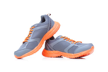 Running shoes with grey and orange colors