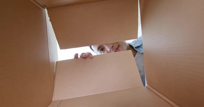 man open the box