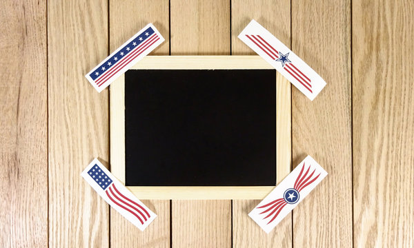Chalk board with USA Logos Over Wood Background. Photo image