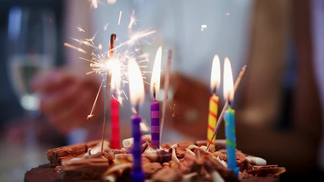 Birthday Cake With Sparkler And Burning Candles, Close Up