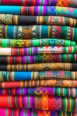 Colorful traditional peruvian textiles, in a market near Machu Picchu