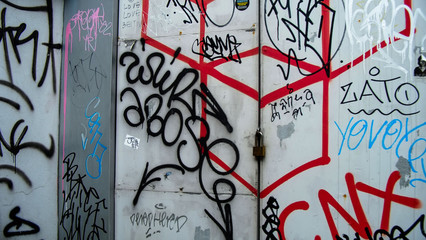graffiti tag with spray from public wall