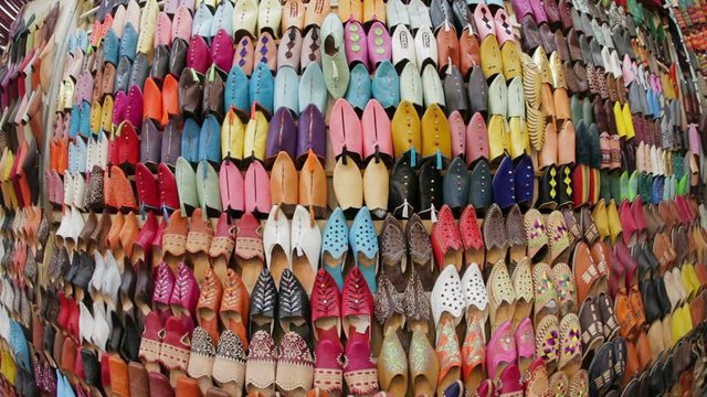 Soft leather Moroccan slippers in the Souk, Medina, Marrakesh, Morocco, North Africa