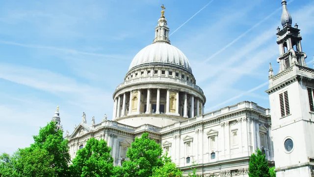 LONDON - MAY, 2017: The dome and steeple of St Paul&rsquo;s Cathedral against blue sky, Ludgate Hill, London, EC4 
