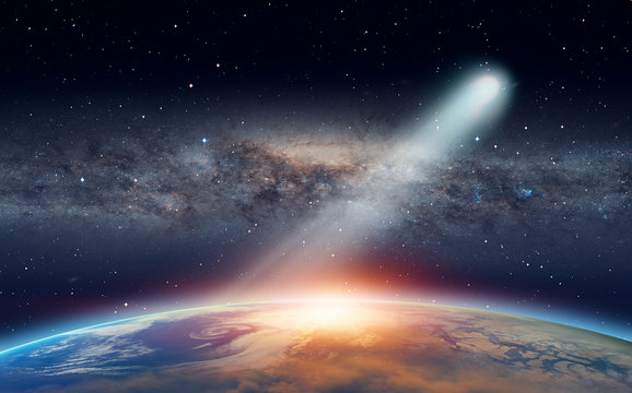 Bright comet approaching to The Sun in space "Elements of this image furnished by NASA."