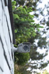 Street surveillance camera on the fence.