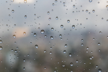 Rain drop on the window glass