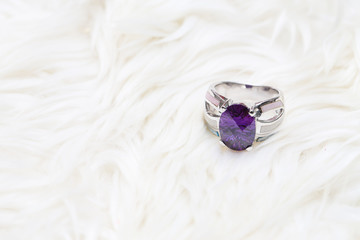 diamond ring and purple gemstone