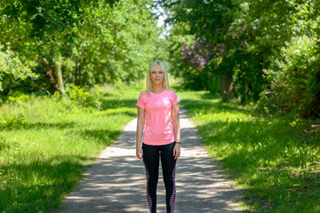 Young woman waiting to start running