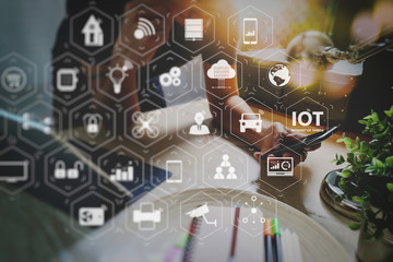 Man using VOIP headset with digital tablet computer docking smart keyboard, concept communication, it support, call center and customer service help desk,filter film effect