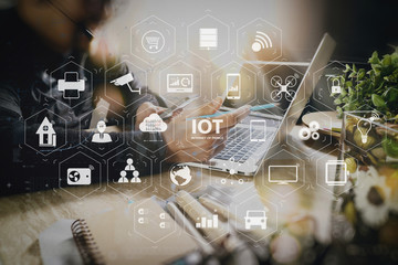 Man using VOIP headset with digital tablet computer docking smart keyboard, concept communication, it support, call center and customer service help desk,filter film effect