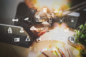 Man using VOIP headset with digital tablet computer docking smart keyboard, concept communication, it support, call center and customer service help desk,filter film effect