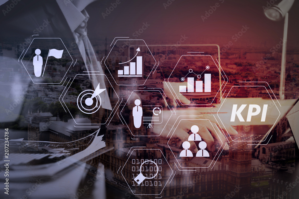 Poster businessman using digital tablet and laptop computer and document in modern office