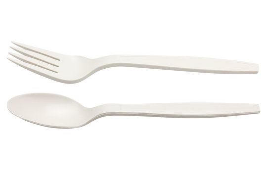 plastic spoon and fork isolated on white background