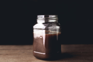 Black coffee in glass In low light Window light