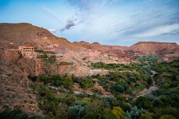 Fototapeta premium Aerial view of oasis and mountains in Dades Valley near Boumalne Dades village in Morocco