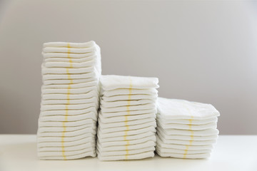Stack of baby disposable diapers. Baby hygiene