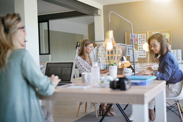 Businesswomen working in co-working space