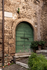 Fototapeta na wymiar green door in ancient country