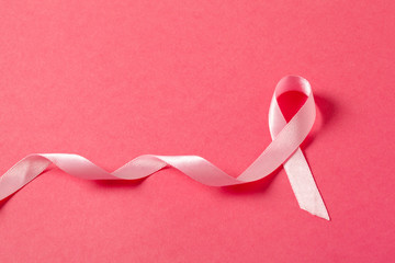 pink ribbon breast cancer on pink background