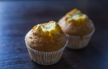 two cakes with a bitten top