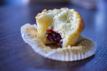 small muffin with cherry jam